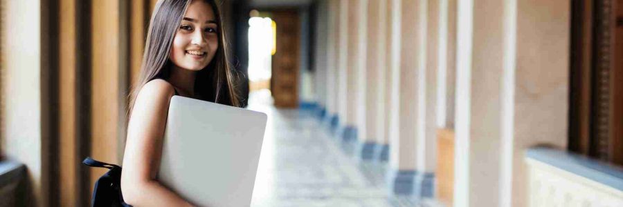 Young asian student on university campus with computer laptop